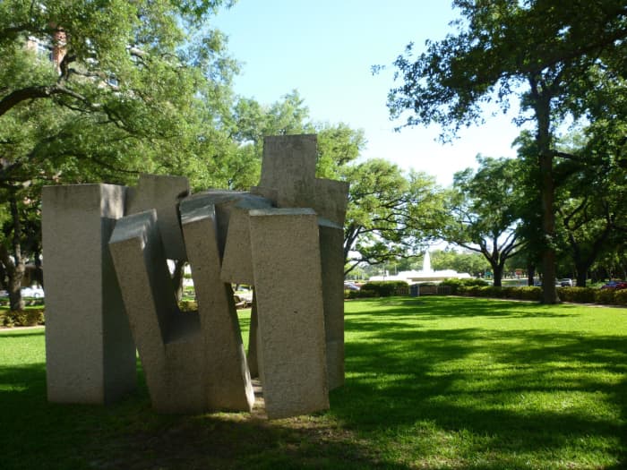 Granite sculpture titled Song of Strength by Eduardo Chillida on the front lawn of MFAH
