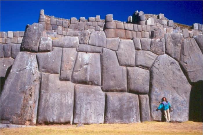 This is an ancient wall, exact builder unknown. We are not even sure how they moved the blocks and fitted them so tightly.