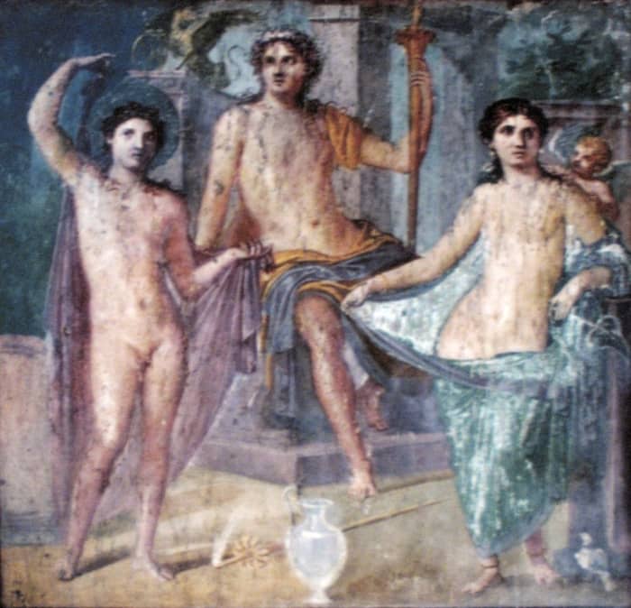 Aphrodite/Venus, goddess of love and beauty, with Ares/Mars, god of war. Sitting enthroned in the middle is Zeus/Jupiter, king of the gods.