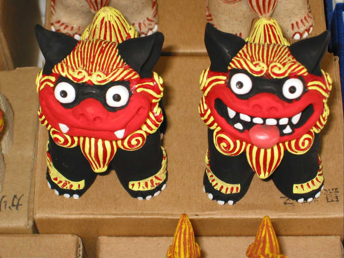 A beautiful pair of Shisa. Notice the guardian dog on the left has a closed mouth, while the one on the right has it's mouth open. Tradition states that this is how Shisa should be positioned.
