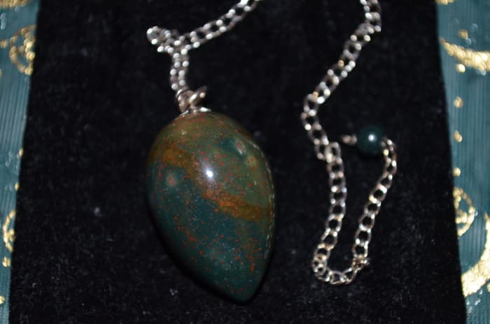 My bloodstone pendulum. A pendulum with a power stone can make it much easier to communicate with a spirit.