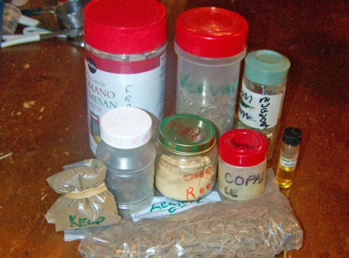 I like to recycle. I use old spice jars, babyfood jars, or any container I can clean and recycle. You can see my frankincense there in an old Parmesan cheese container. And some things I keep in plastic baggies.