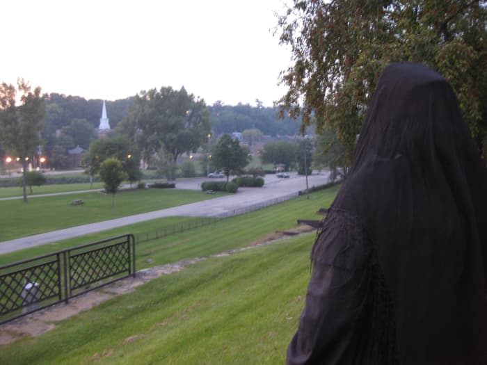 Annie Wiggins talks about Galena area ghost stories during her walking tour. The tale of murder and haunting in Posy Hollow, a nearby area with a horrible past, is often commonly told on Halloween.