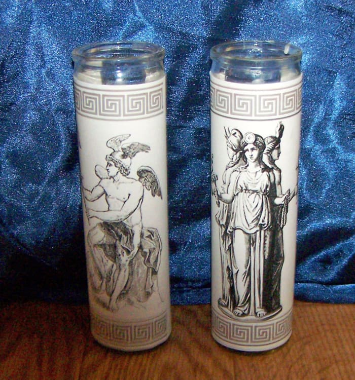 Resize an image of your deity, print it, and glue or tape it around the glass casing of a pillar candle. Affordable and effective. I use these on my ritual altar during worship.
