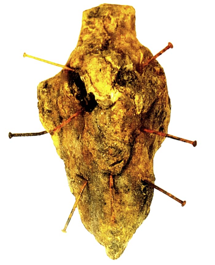 This item is a dog's heart with pins from the Museum of Witchcraft, and features in the book.