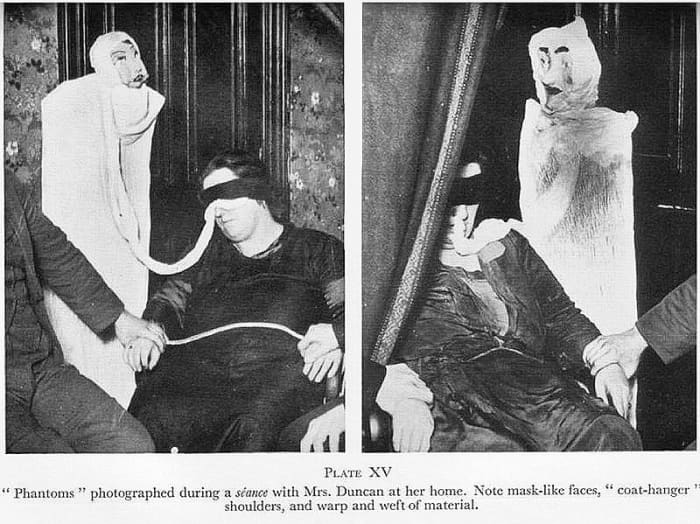 Helen Duncan performs the old ectoplasm/cheesecloth illusion and conjures up strange looking effigies.