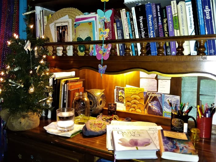 Here is the little desk I've had since age 15 that I go to every day for my morning meditation. This includes my astrology and some other books with a myriad other little healthy items of inspiration.