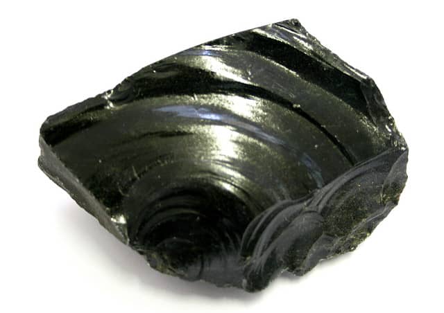 Obsidian is formed when lava cools quickily and in unable to crystalise.