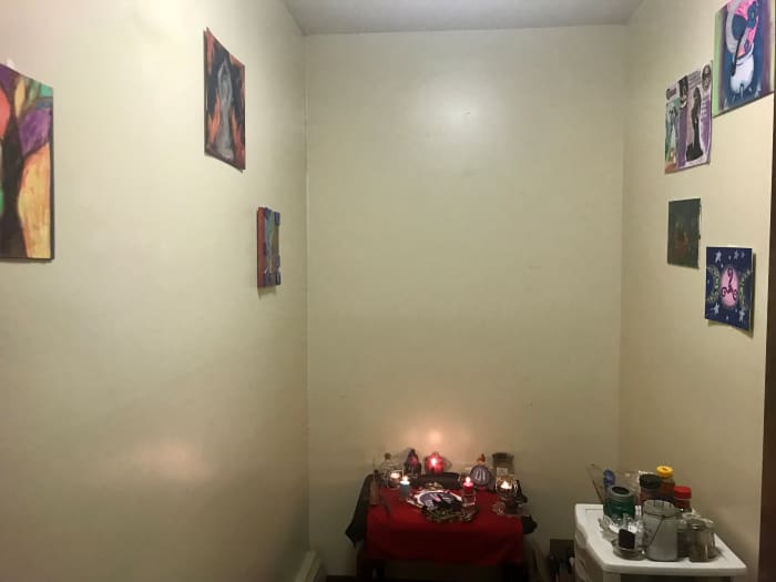Even though I'm out of the "broom closet", I use this walk in closet to meditate, store my magical tools, and keep my Goddess altar. (and put a child proof knob on the door so my son doesn't come in and hurt himself or break anything!)