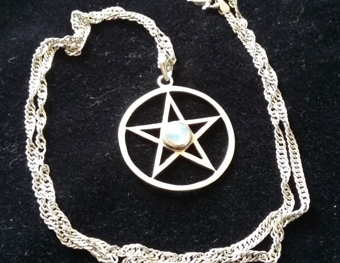 The pentagram, the star, represents the four directions/elements presided over by spirit (universal energy).