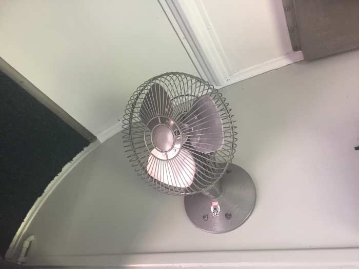 Modern-day transportation generally offers air conditioning to combat the heat. Byron Bay's solar train boasts old-fashioned fans ... and open windows.