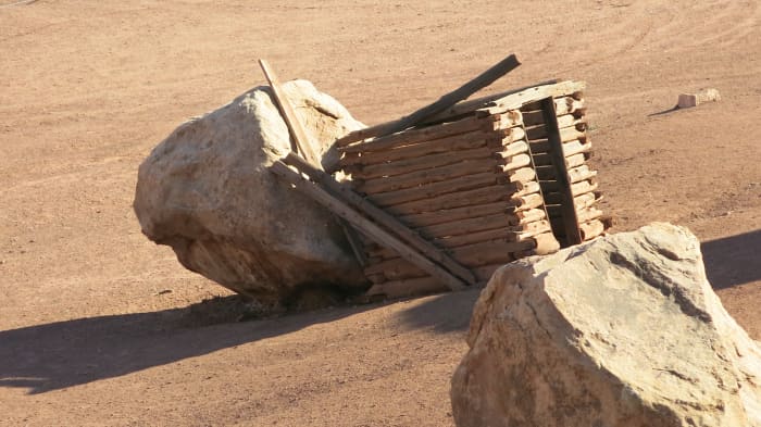 Exterior view of latrine. Note that it sits on the slope of the hill, which allowed water flowing down the mountain during rain storms to flush it out.