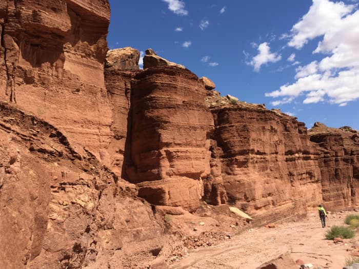 My wife hiking in canyon carved out by Cathedral Wash located north of Navajo Bridge and Cliff Dwellers