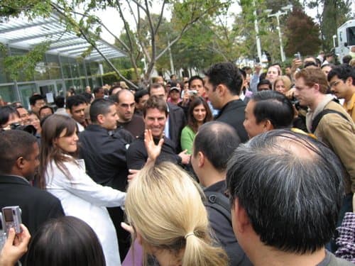 Katie Holmes and Tom Cruise in a sea of hungry sharks.