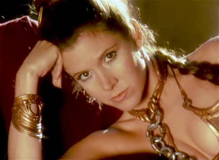 Carrie Fisher, young and beautiful, raised eyebrows (and temperatures) when she wore a metal bikini in Return of the Jedi.