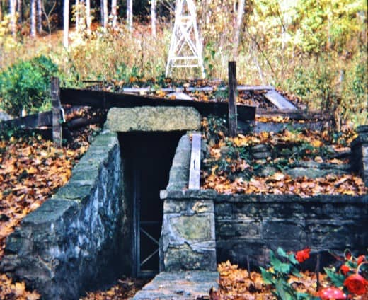 First place in which they lived (cave in the ground) until the houses were built at Little Norway.