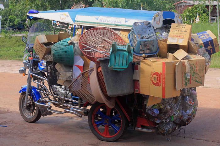 In the cities, the motorised tricycle known as a tuk-tuk is used as a taxi, but in the villages it may be used for transporting goods ...