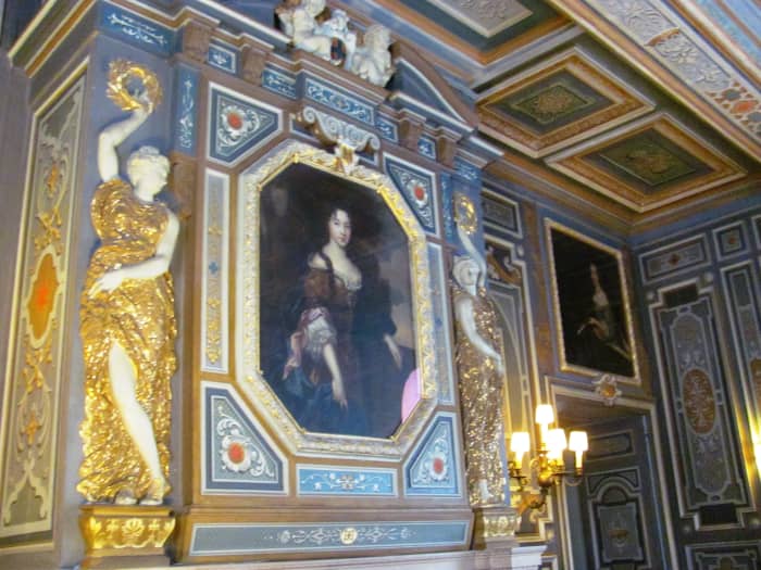 The Grand Salon features family portraits, artwork, an 18th century harp that still works, and furniture signed by the cabinetmakers to royalty.