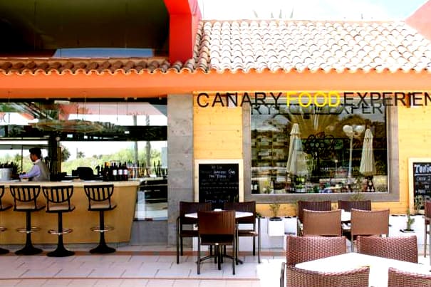 The Reception bar on the left and the Canary Food Experience shop on the right