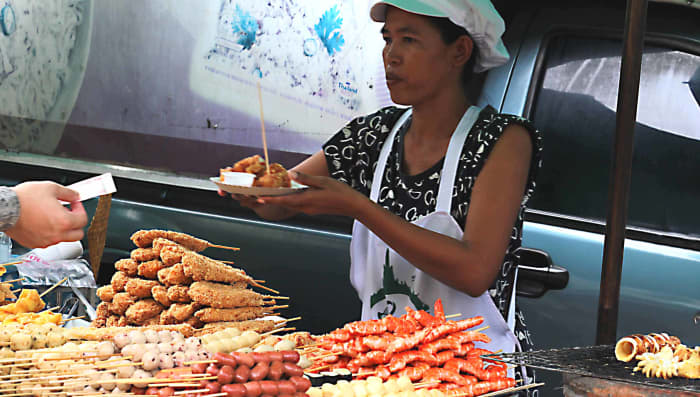 Food stalls are very common in the markets and along the streets and what's on offer is extremely varied. Here meats - beautifully cooked and tender - are on offer. One skewer of meat generally costs about 10 baht (20p / 30c)