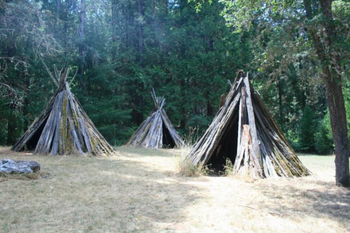 Several bark houses show visitors to the park how Miwok people lived before settlers from around the world came to California.