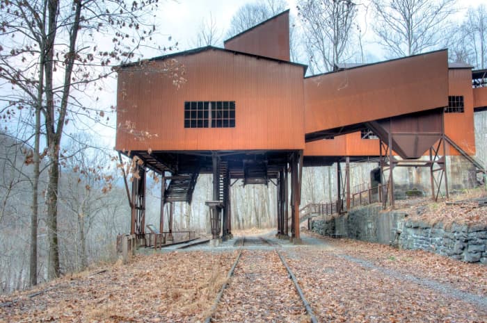 A short hike along a gravel road allows hikers to explore the Nuttall Coal Mine headhouse.