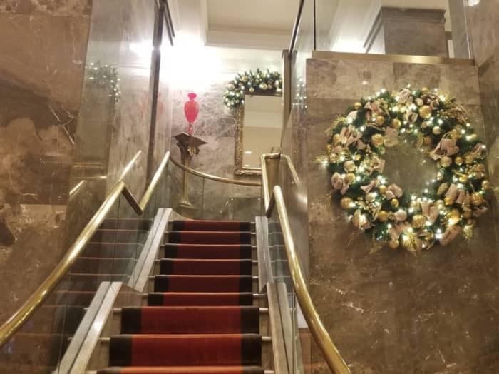 The beautiful stairway leading from the first floor lobby and lounge area to additional lounge space on the second floor.