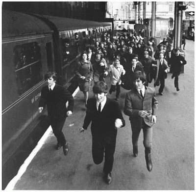 Imagine the Beatles trying to run in Disney character costumes, but being unable to see where they were going. "Help!" indeed.