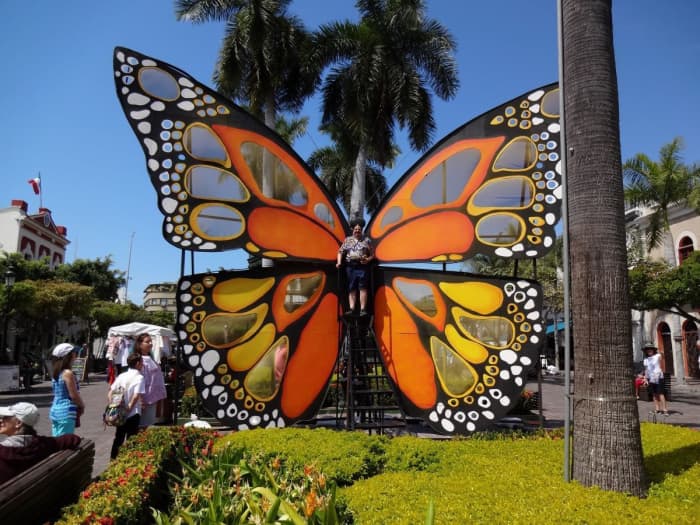 Butterfly in Machado Square. Speedy tagged along for a photo climbing a rickety stairway with no handrail.