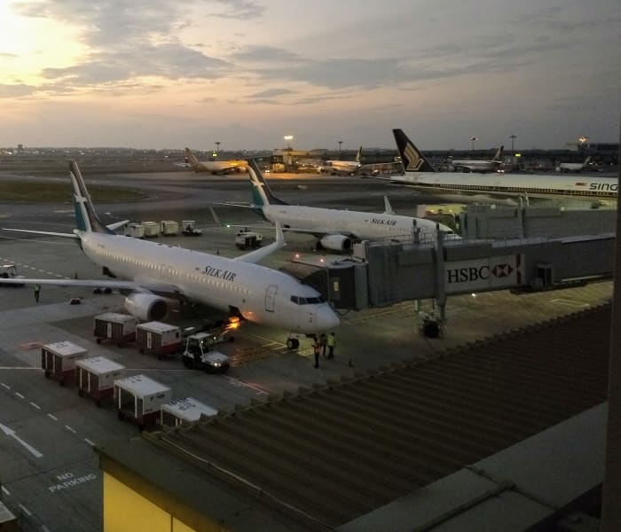 Although we could hear the jets taking off and landing outside the room, they sounded like the rumble of distant thunder.