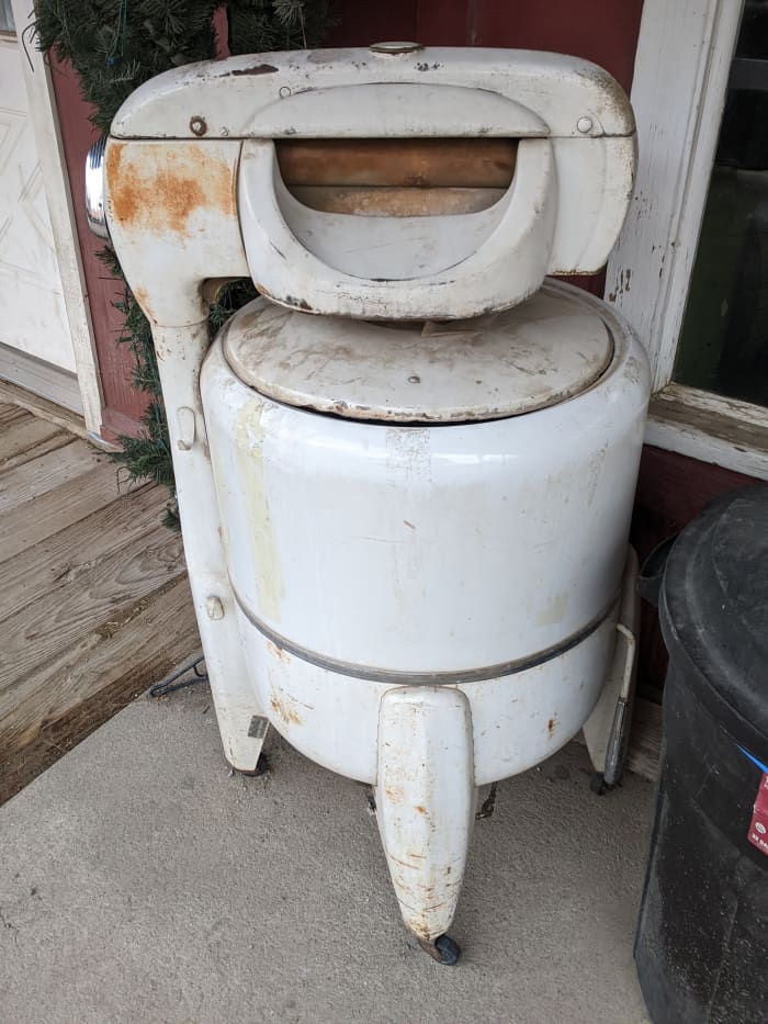 Washing machines like this one our grandmothers used to use. It was better than washing by hand, but it had to be filled manually then drained and refilled to rinse, then run through ringer on top to wring out before hanging wash outside to dry.
