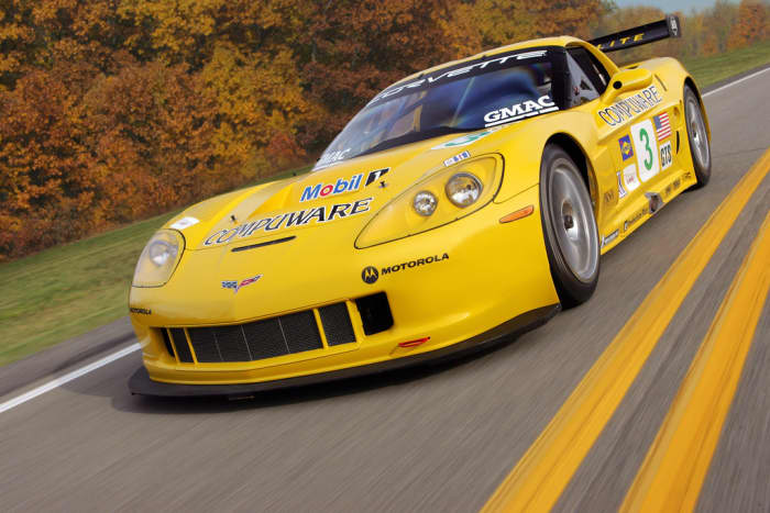 Race cars in dreams may mean that you're driven but beware of the dangers of taking life on too fast.