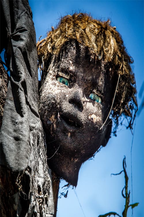 Although the dolls are intended to drive off evil spirits, many of them look as if they are themselves possessed.