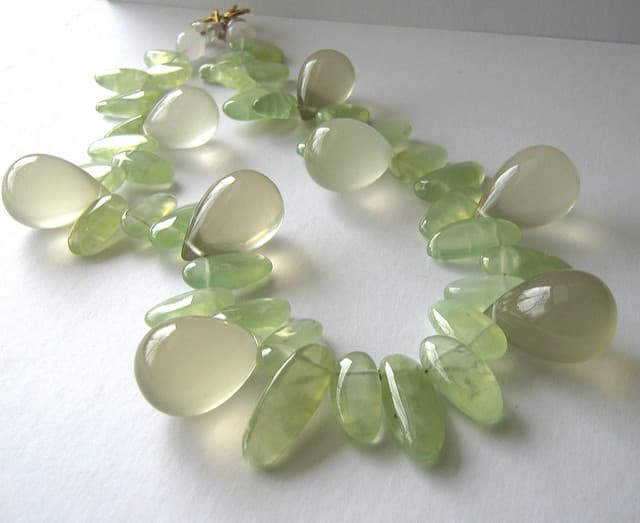 A prehenite and lemon quartz necklace. Jewellery is an excellent and practical way to benefit from a crystals properties.