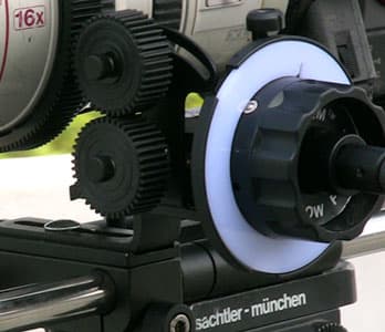 A Follow-focus device. Note the white wheel on which the Focus puller will mark his distances.