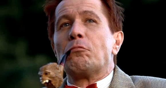 Gary Oldman as O. W. Grant. Notice the monkey head pipe...maybe an allusion to the legend of the monkey's paw?