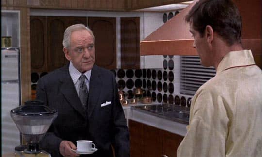 The Modern Kitchen in 'Live and Let Die' complete with an espresso machine ( oh, and a shapely pair of legs hiding in the wardrobe to avoid M)