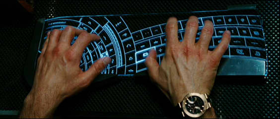 "Courtesy of Iron Man the movie....Tony Stark doing some engineering work on a wacked out keyboard not even in English."