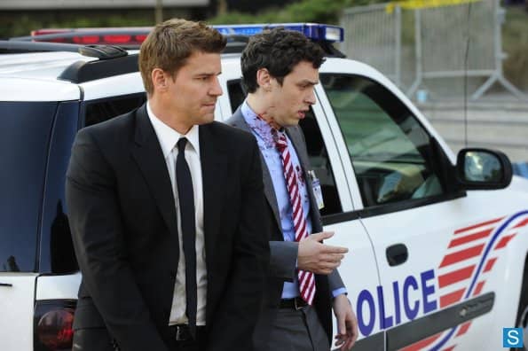 Booth and Sweets watch the aftermath of "Grave Digger's" execution by a sniper in the sixth season episode "The Bullet In The Brain".