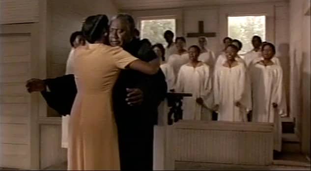 In tears of forgiveness, as if God is telling them to do so, Shug and her father become reconciled after years of separation.