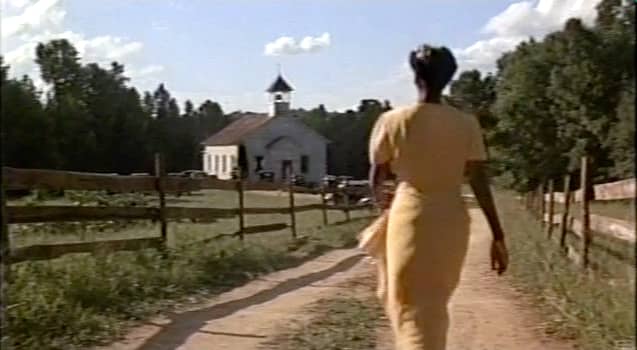 Shug cannot help from being drawn to her father's nearby church, from where the anointed song "God is Trying To Tell You Something" is emanating.