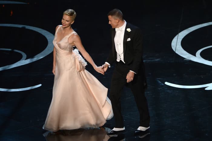 Charlize Theron dances with Channing Tatum at the 2013 Oscars, held at the Dolby Theater in Hollywood, California. Theron won the Oscar for "Best Actress" in 2004 for her portrayal of a female serial killer in "Monster."