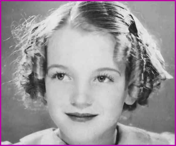Looking at this sweet and innocent young face, it's hard to believe that in the future this young lass will become the greatest sex symbol in the world, one day to be known as "Marilyn Monroe."
