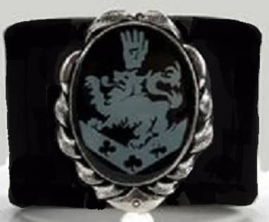 Edward is seen wearing the Cullen family crest on his wristband in the movie. The Cullen's are a coven of vampires, but there is no mention of a family symbol in the book.
