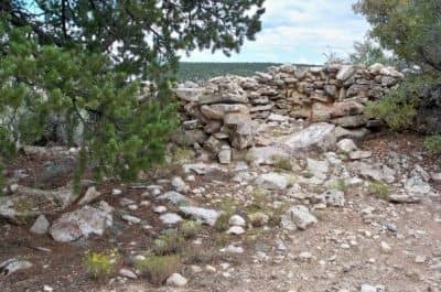 There are indian ruins (pictured here) and remnants of William Wallace Bass's camp to explore near the trailhead.