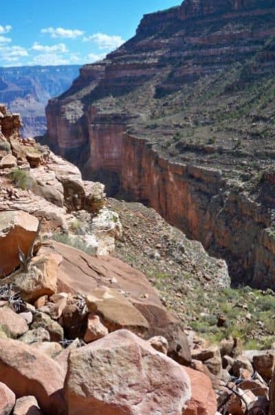 The trail switches back and forth along the Redwall, eventually dropping into Bass Canyon which provides some nice shade.