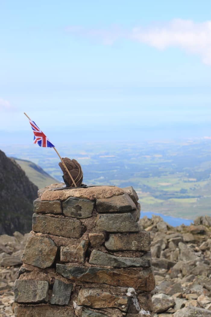 Looking out from the trip point at the to of Scafell Pike with a fitting Union Jack