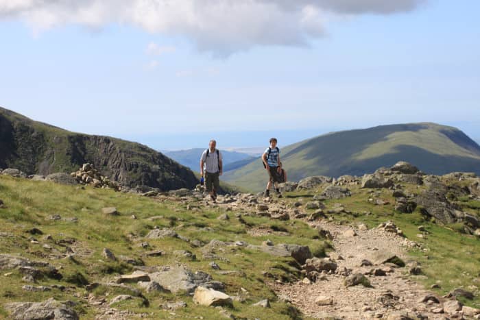 You're never alone on Scafell- Plenty of walkers out on a good day. (To the left of the photo is the edge towards the Peak of Sca Fell which isn't to be confused with Scafell Pike- it's a different mountain)
