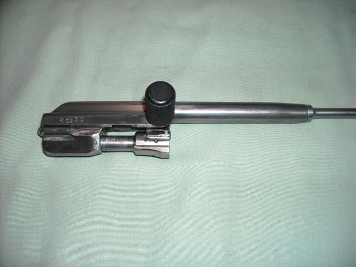 This is a fully re-assembled bolt and bolt carrier group. You will re-insert this group back into the receiver this way.
