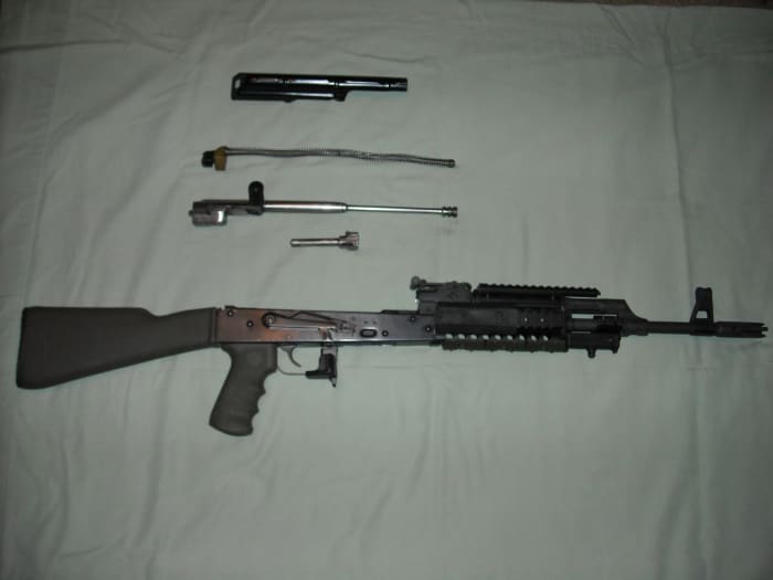 This is what your AK-47 should look like when field stripped ( the piston chamber or upper handguard is still on and does not need to be removed to be cleaned).